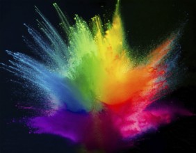 Colorful abstract art depicting a vibrant explosion of rainbow hues on a dark background, evoking