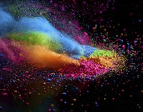 A colorful explosion powder on black background.. Multicolored powder explosion, AI generated