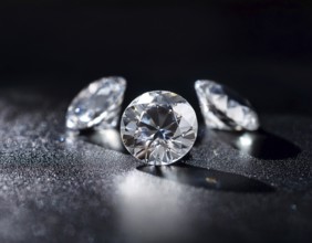 A brilliant collection of diamonds illuminated with striking lighting effects, emphasizing their