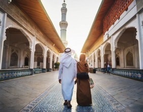 Travelers walk through an scanic architecture and culture of Muslim country, AI generated