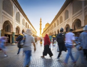 Travelers walk through an scanic architecture and culture of Muslim country, AI generated