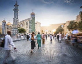 Travelers walk through an scanic architecture and culture of Muslim country, AI generated