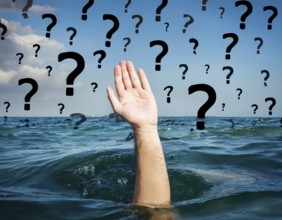 An extended hand emerges from water surrounded by floating question marks, artistically