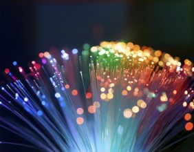 Glowing fiber-optic lights in vivid colors, creating a futuristic and dynamic visual effect, ideal
