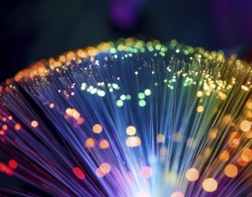 Glowing fiber-optic lights in vivid colors, creating a futuristic and dynamic visual effect, ideal
