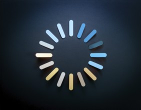Loading symbol displayed against a dark-textured backdrop. Ideal for technology, progress, or