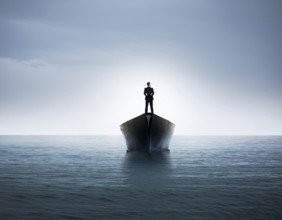 A surreal and contemplative scene of a businessman standing alone on a boat over calm ocean waters.