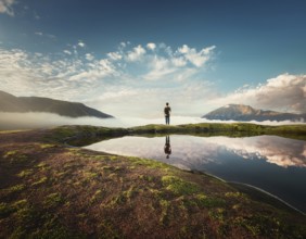 A solitary person, evoking feelings of solitude, introspection, and natural beauty, AI generated