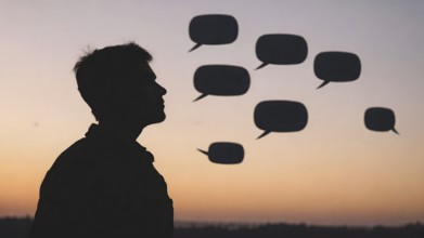 Thinking man silhouette with speech bubble concept, symbolizing dialogue, reflection, creative