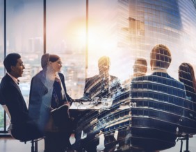 Double exposure image of business people with a modern city. Concept of teamwork, AI generated