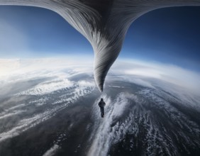 Tornado concept image showing powerful funnel cloud, symbolizing destructive natural forces,
