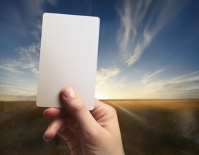 Hand holding a sheet of paper in hand.. AI generated image, ai