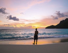 Man on the beach art poster, distant silhouette print symbolizing reflection, solitude, and harmony
