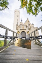 Locked chain on a bridge with a view of a castle gate, Lichtenstein Castle, Lichtenstein, Swabian