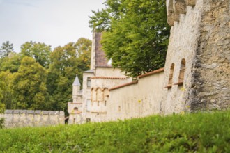 Medieval castle walls and towers surrounded by trees, Lichtenstein Castle, Lichtenstein, Swabian