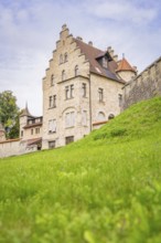Impressive historic building with gabled roof and green meadow, Lichtenstein Castle, Lichtenstein,