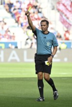 Referee Referee Robert Hartmann shows yellow card yellow caution Football Bundesliga, PreZero