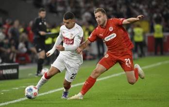 One-on-one, action Badredine Bouanani VfB Stuttgart (27) against Lars Ritzka FC St. Pauli (21)
