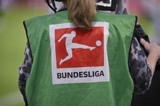 TV camera, camerawoman from behind, bib, logo football Bundesliga, MHPArena, MHP Arena Stuttgart,