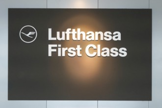 Illuminated sign in the airport for a lounge with the inscription Lufthansa First Class, Frankfurt,