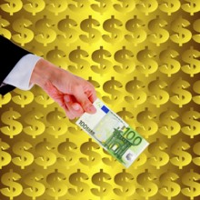 Symbolic image, hand holds out 100-euro note in front of dollar wall, Wall Street and Dax upswing,