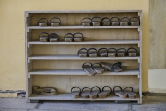 Wooden shelf with traditional sandals in the mosque, Ibrahim Pasha Mosque, Old Town, Turkish