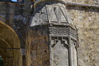 Historic masonry with detailed relief elements and play of the sun on the surface, Recep Pasha