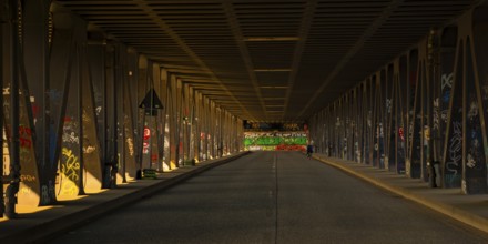 View along the road of the Oberhafenbrücke, person as an accessory, Hamburg, Germany