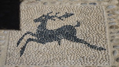Mosaic artwork of a deer made of pebbles in the street, Turkish Quarter, Rhodes Old Town, Rhodes
