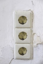 Symbolic image of need for refurbishment, sockets with child protection, Germany
