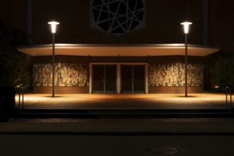Night shot of the main entrance to the parish church of St Peter and Paul, Neustadt am Rübenberge,