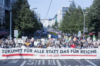 Demonstrators with front banner Future for all instead of gas for the rich on Friedrichstraße at