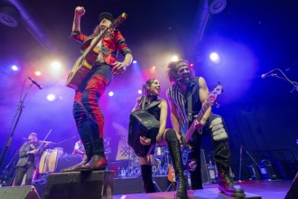 Eugene Hütz, left, singer and guitarist, Gogol Bordello, folk-punk band, USA, live on Fall 2025