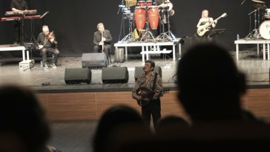 Turkish singer Coskun Sabah performs on stage at Gaziantep University as part of the Türkiye Kültür
