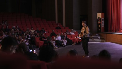 Turkish singer Coskun Sabah performs on stage at Gaziantep University as part of the Türkiye Kültür