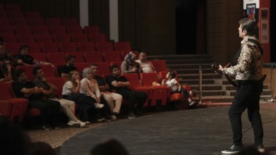Turkish singer Coskun Sabah performs on stage at Gaziantep University as part of the Türkiye Kültür