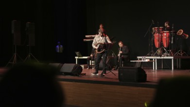 Turkish singer Coskun Sabah performs on stage at Gaziantep University as part of the Türkiye Kültür