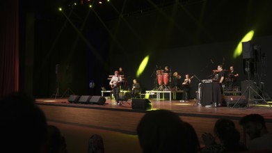 Turkish singer Coskun Sabah performs on stage at Gaziantep University as part of the Türkiye Kültür