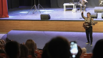 Turkish singer Coskun Sabah performs on stage at Gaziantep University as part of the Türkiye Kültür