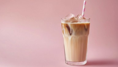 Refreshing Pink Glass Of Iced Coffee Milk. Delicious Cold Beverage To Enjoy On A Hot Day. Perfect