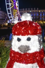 Festive penguin decoration adds a touch of magic to the christmas market in bayonne, france, with a