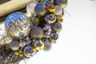 Christmas balls and lights hanging at night in bayonne, france, creating a festive atmosphere