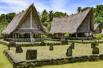 Left traditional community house right Faluw men's house Men's House meeting houses in museum