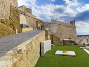 Left staircase to Tor tor of Cittadella Citadel of Gozo, bottom right monument to Ottoman invasion,