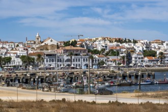 The skyline of the old town of Lagos, on the river Bensafrim, harbour channel, in the west of the