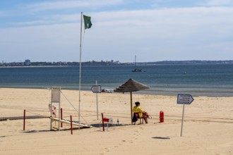 The Praia de São Roque beach, east of Lagos town centre, quite empty, lifeguards on duty,