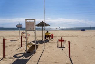 The Praia de São Roque beach, east of Lagos town centre, quite empty, lifeguards on duty,