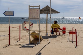 The Praia de São Roque beach, east of Lagos town centre, quite empty, lifeguards on duty,