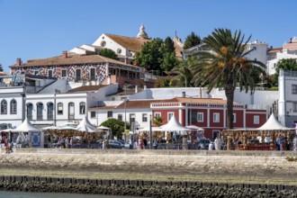 The skyline of the old town of Lagos, on the river Bensafrim, harbour channel, in the west of the