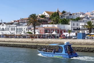 The skyline of the old town of Lagos, on the river Bensafrim, harbour channel, in the west of the